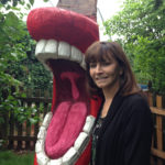 Clara Poses at the Totem
